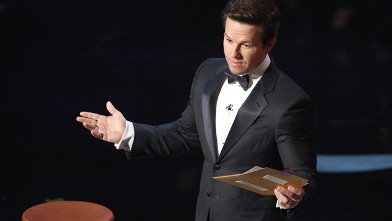 PHOTO: Actor Mark Wahlberg speaks onstage during the Oscars held at the Dolby Theatre, Feb. 24, 2013 in Hollywood.