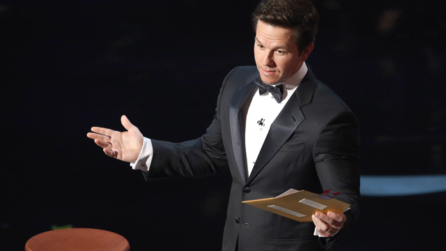 PHOTO: Actor Mark Wahlberg speaks onstage during the Oscars held at the Dolby Theatre, Feb. 24, 2013 in Hollywood.
