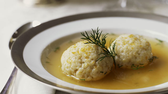 PHOTO: Vegetable soup with matzo balls and dill oil.