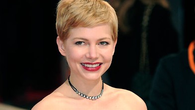 PHOTO: Michelle Williams poses on the red carpet arriving at the BAFTA British Academy Film Awards at the Royal Opera House in London on Feb. 12, 2012.