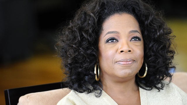 PHOTO: US talk show queen Oprah Winfrey looks on as she answers to journalist's questions at her South African girls' academy, Jan. 13, 2012 in Henley on Klip.