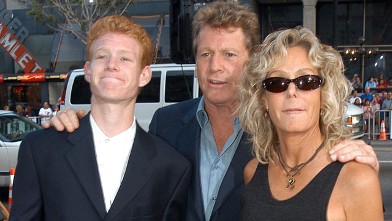 PHOTO: Ryan O'Neal, son Redmond and Farrah Fawcett arrive at
<p>
"Malibu's Most Wanted" Los Angeles Premiere, April 10, 2003.