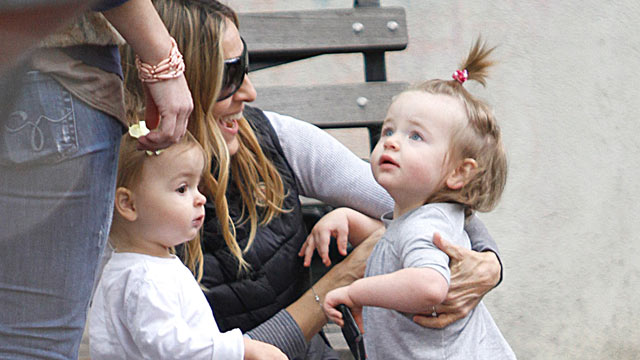 PHOTO: Sarah Jessica Parker is seen with her twin daughters Marion (R) and Tabitha Broderick on the streets of Manhattan, October 23, 2010.