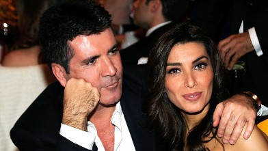 PHOTO: Simon Cowell and Mezhgan Hussainy attend the 18th Annual Elton John AIDS Foundation Academy Award Party at Pacific Design Center, March 7, 2010 in West Hollywood, Calif.