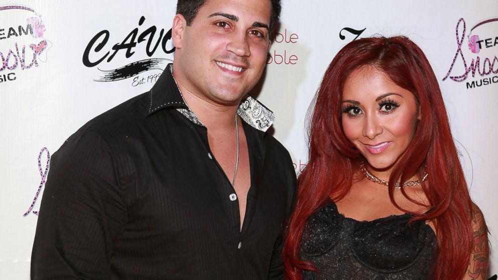 PHOTO: Jionni LaValle and Nicole Snooki Polizzi attend a birthday party held in Snookis honor at Cavo, Dec. 6, 2013 in New York City.