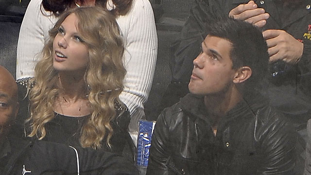 PHOTO: Taylor Lautner and Taylor Swift attend the NHL game between the Columbus Blue Jackets and the Los Angeles Kings during the game on October 25, 2009 at Staples Center in Los Angeles, Calif.