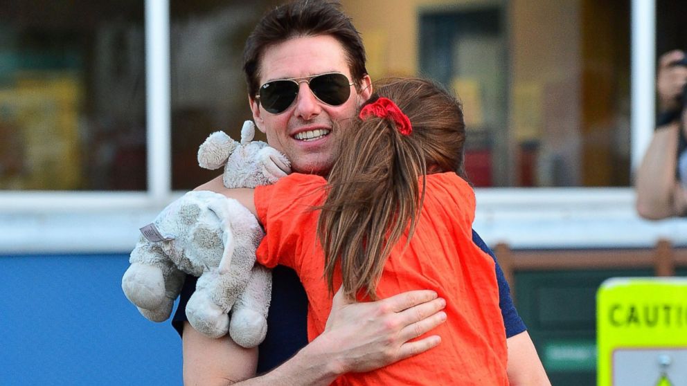 PHOTO: Tom Cruise and Suri Cruise leave Chelsea Piers on July 17, 2012 in New York City.