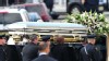 Pallbearers carry Whitney Houston's casket to a hearse outside New Hope Baptist Church after funeral services, Feb. 18, 2012 in Newark, New Jersey.