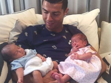 Soccer star Cristiano Ronaldo introduces his newborn twins