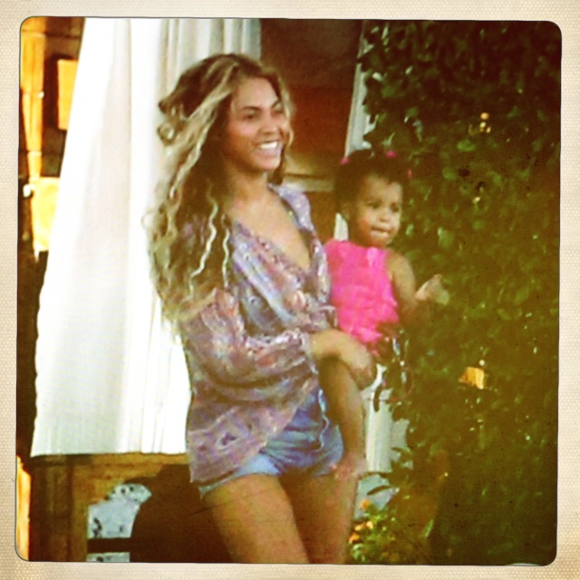 PHOTO: Beyonce and Blue Ivy are seen on the beach.