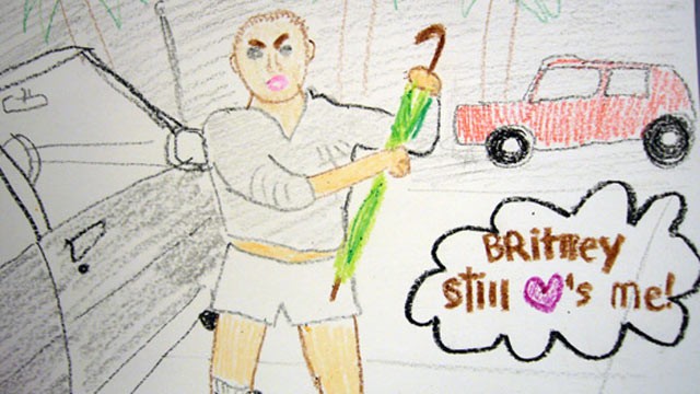 britney spears bald umbrella. Britney Spears brandishing