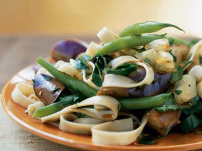Cooking Light's eggplant and onion noodle salad with warm soy-rice vinaigrette is shown here.