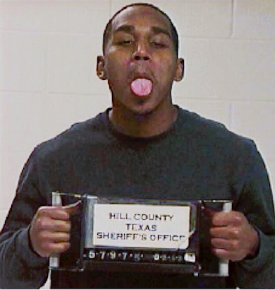 Man Sticks Out Tongue for Mugshot