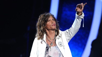 PHOTO: Judge Steven Tyler makes his entrance during the American Idol Grabd Finale at the Nokia Theatre, May 25, 2011 in Los Angeles, California.