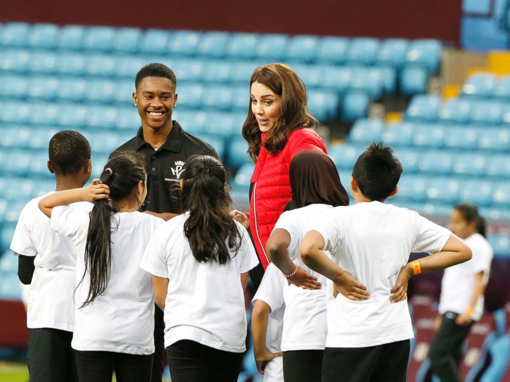 PHOTO: Catherine, Duchess of Cambridge, speaks to children at Aston Villa Football Club, Villa Park in Birmingham, England, Nov. 11, 2017.