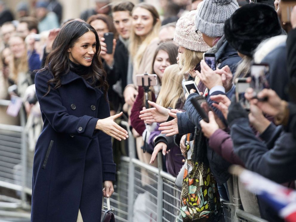 PHOTO: Meghan Markle greets the crowd as she and Prince Harry visit the Terrence Higgins Trust World AIDS Day Charity Fair in Nottingham, England, Dec. 1, 2017.