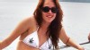 PHOTO Twilight actress Kristen Stewart is pictured in a bikini adorned with marijuana leaves while she relaxes with a male friend in Costa Rica
