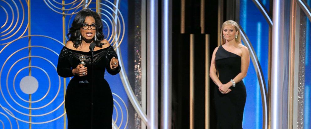 PHOTO: Oprah Winfrey accepts the Cecil B. DeMille Award as presenter Reese Witherspoon looks on, at the 75th Annual Golden Globe Awards in Beverly Hills, Calif., Jan. 7, 2018.