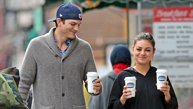 PHOTO: Ashton Kutcher steps out with his girlfriend Mila Kunis as they grab a coffee and a copy of the New York Post, Oct. 8, 2012.
