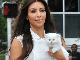 Photos: Kim Kardashian Adopts