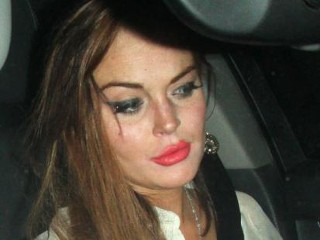 Photos: Lohan Over-Primps for Party