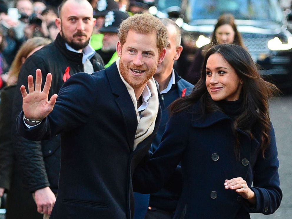 PHOTO: Britains Prince Harry and his fiancee US actress Meghan Markle greet wellwishers on a walkabout as they arrive for an engagement at Nottingham Contemporary in Nottingham, England, Dec. 1, 2017.