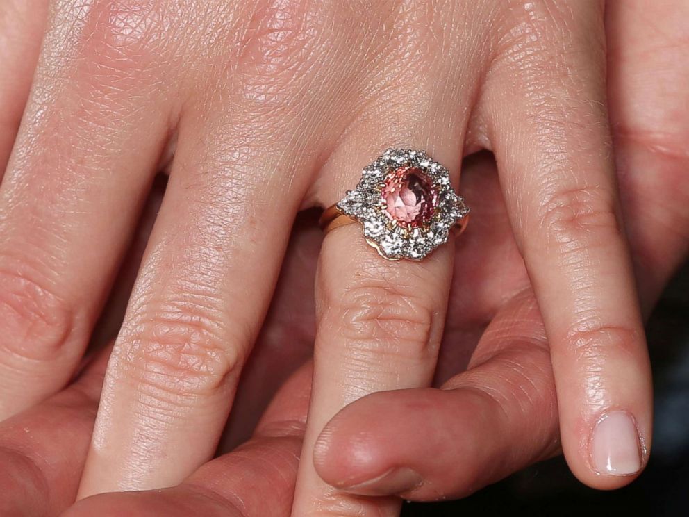 PHOTO: Princess Eugenie shows her engagement ring containing a padparadscha sapphire surrounded by diamonds, from Jack Brooksbank in the Picture Gallery at Buckingham Palace, Jan. 22, 2018, in London. 