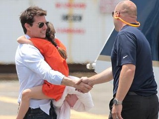 Photos: Tom Cruise Whisks Suri Away