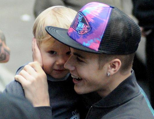 Bieber Turns 19: From Tween Star to Muscle Man