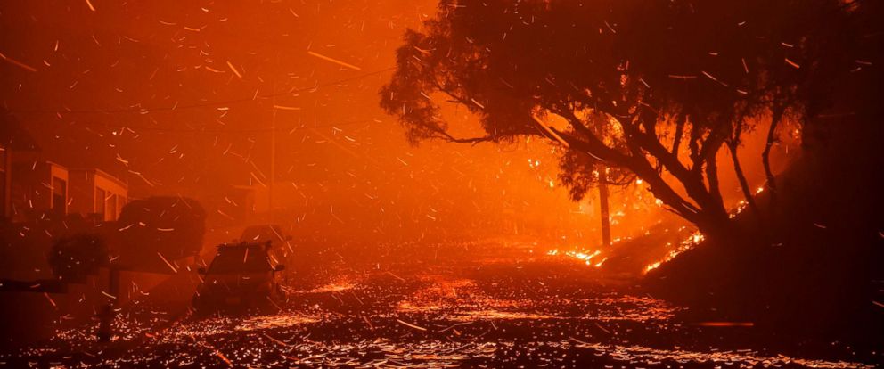 PHOTO: A brush fire moving with the wind sends embers all over the place in residential neighborhoods north of Ventura, destroying homes and forcing 27,000 people to evacuate.