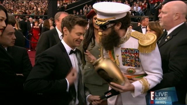 VIDEO: Sacha Baron Cohen dumped ashes on Ryan Seacrest during E! interview.
