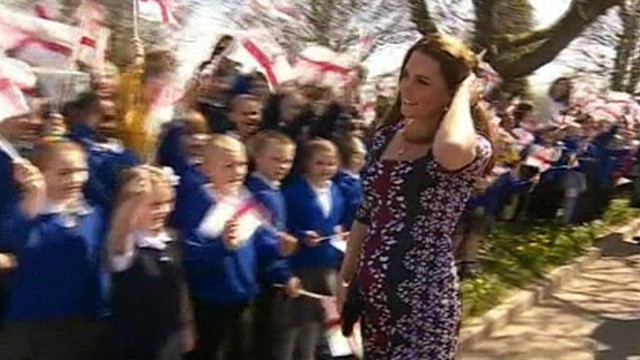 VIDEO: Duchess of Cambridge was given roses during appearance at a school event in Manchester.