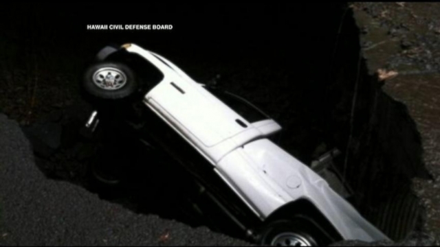 VIDEO: Truck Falls Into a Sinkhole