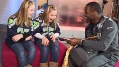 VIDEO: The Seattle Seahawks running back surprised his two biggest fans with tickets to the Super Bowl.