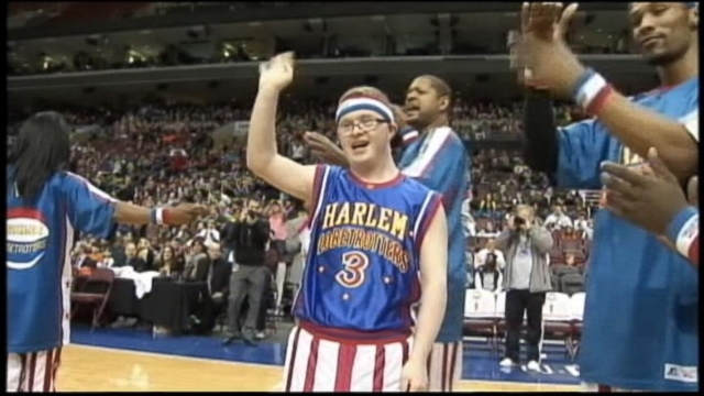 VIDEO: High school basketball player joins his favorite team as the three-point king.