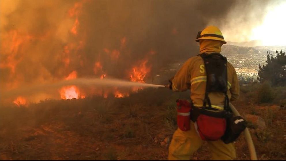 VIDEO: Firefighters battle the blazes overnight as 23,000 evacuation notices have been issued.