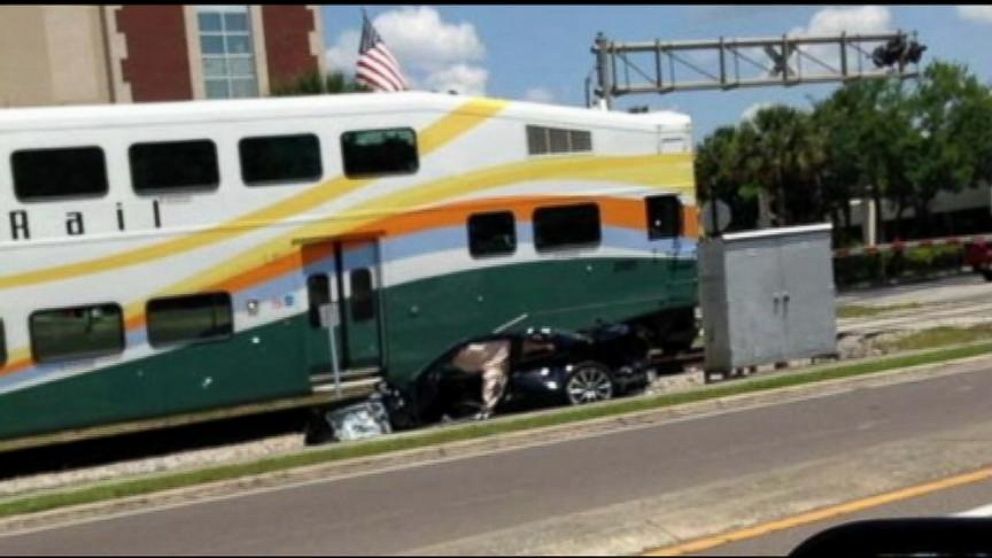 Train Hits Car (Caught on Tape) Woman Escapes Seconds Before Train