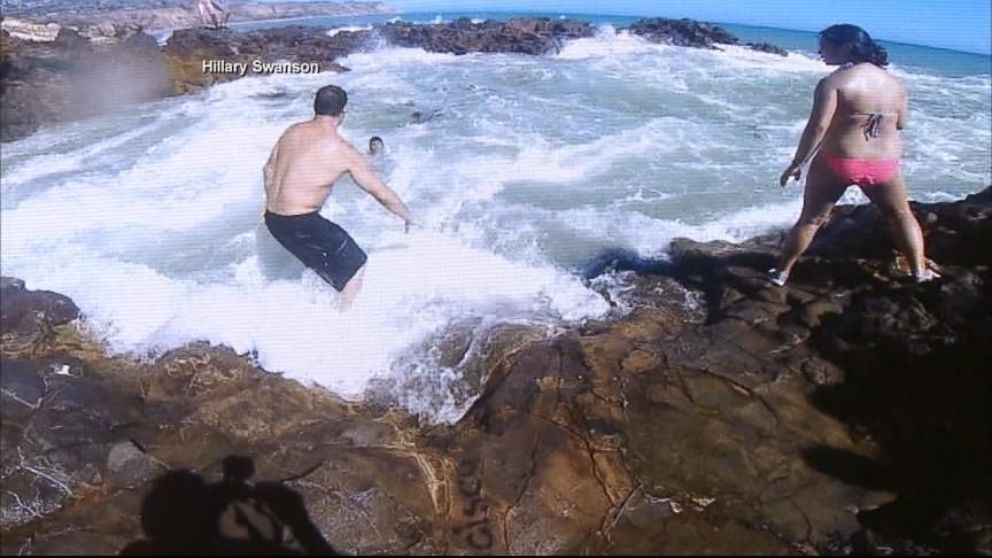VIDEO: When Gary Golding and Rob McNulty saw a teen trapped in a rip current, they dove into action.