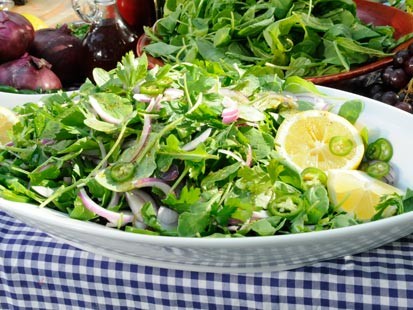 Adam Perry Lang?s dressed arugula.