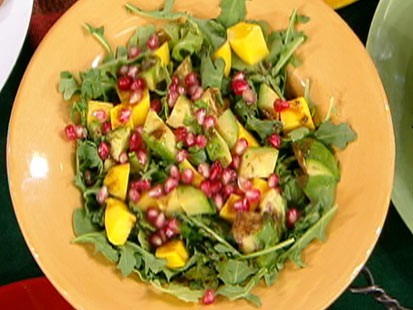 Diane Henderiks arugula, papaya and avocado salad with pomegranate-lime vinaigrette is shown.