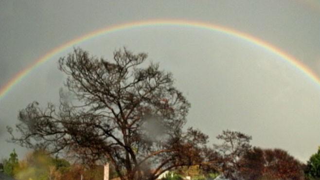 VIDEO: A double rainbow appears over Los Angeles after the area was hit by heavy rains.