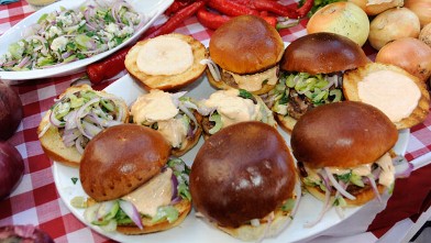 PHOTO: Carla Hall prepares a delicious burger for Labor Day.