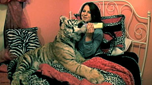 PHOTO: Felicia Fresco, 17, and pet tiger are seen here in Tampa, Fl. in this file photo. Fresco is know to sleep with her tiger. Her family runs an organization called Tiger Encounter.