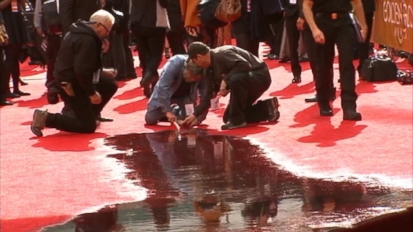 VIDEO: Beverly Hills firefighters had to evacuate an area of the red carpet after a pipe reportedly burst.