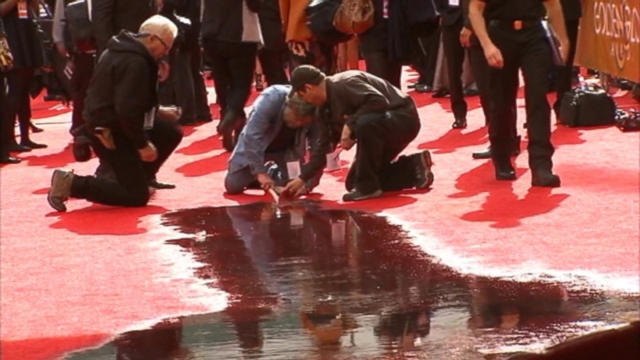 VIDEO: Beverly Hills firefighters had to evacuate an area of the red carpet after a pipe reportedly burst.