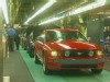 A picture of cars being manufactured.