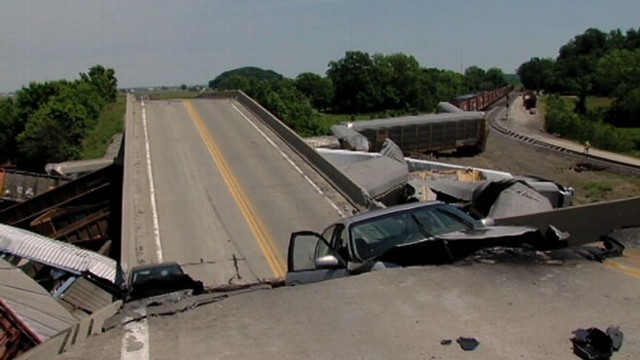 VIDEO: Two Freight Trains Collide Collapsing Highway Overpass