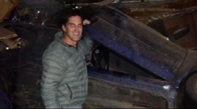 Josh Romney sparked controversy on Twitter after posting picture smiling in front of overturned car.
