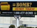 Flashlight bombs hurt 5, prompt billboard warnings