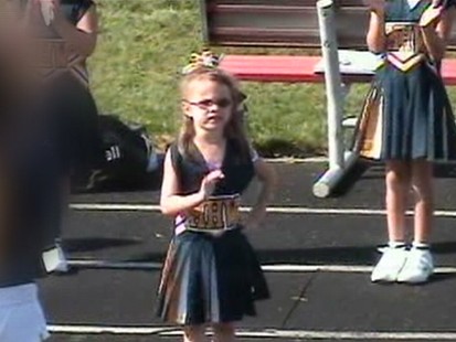 VIDEO: Daughter booted from the squad after mom voices concerns about the chants.